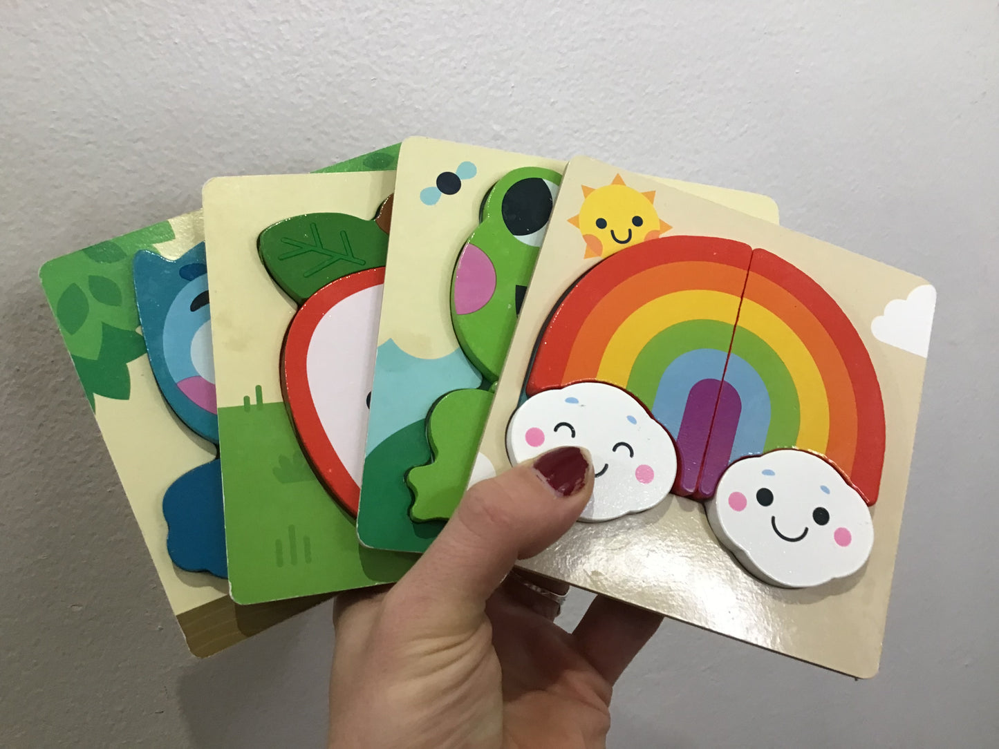 Set of four mini wooden puzzles