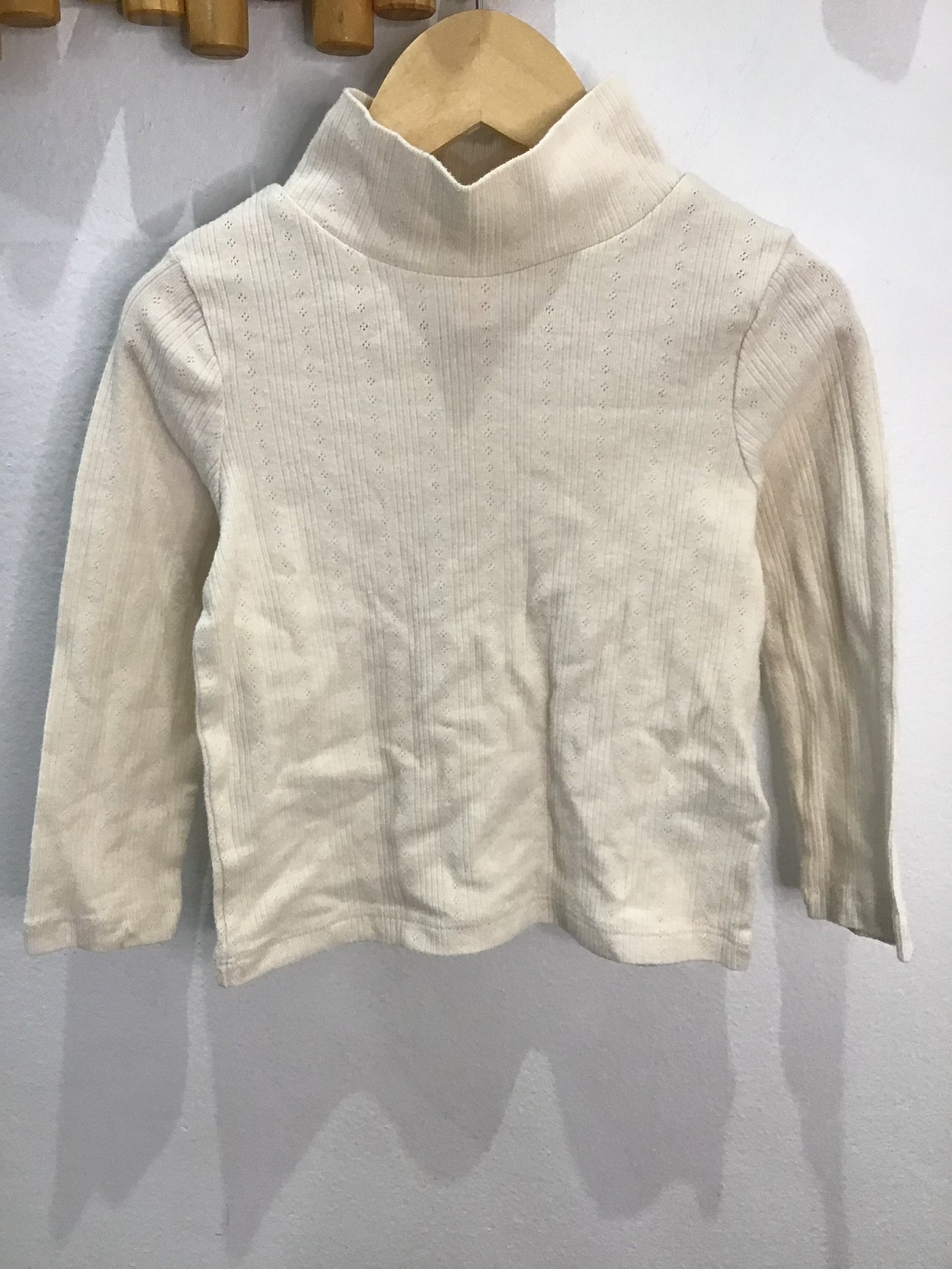 Cream embossed turtleneck 2y