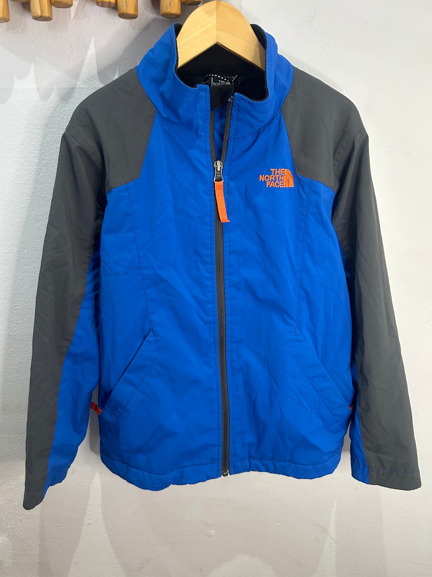 The North Face fleece lined windbreaker blue 10-12y