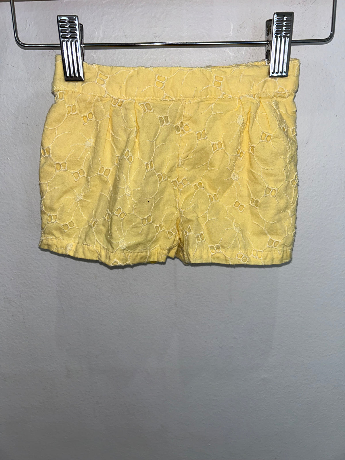 Yellow eyelet shorts 3-6m