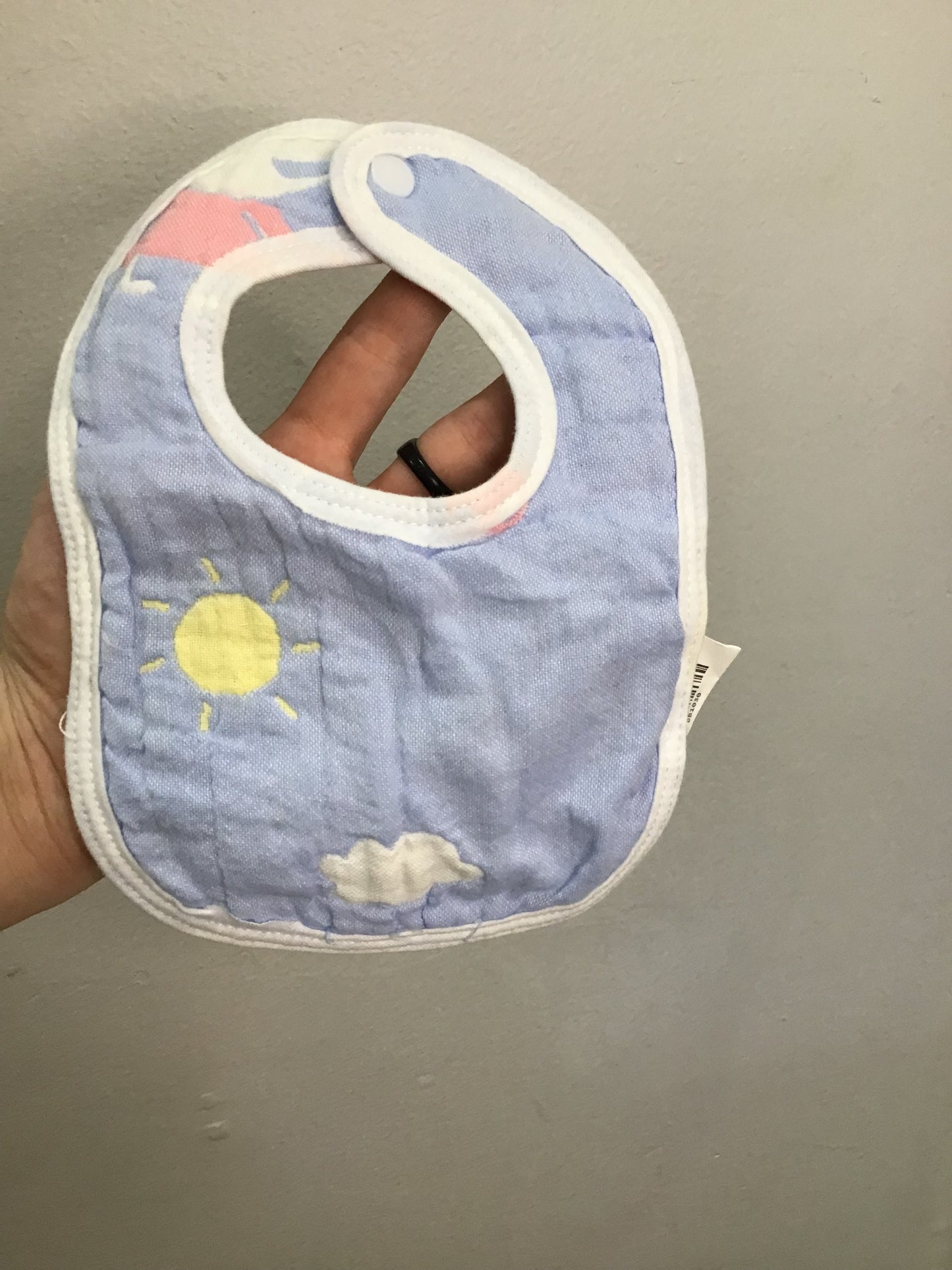 Two baby reversible lined bibs