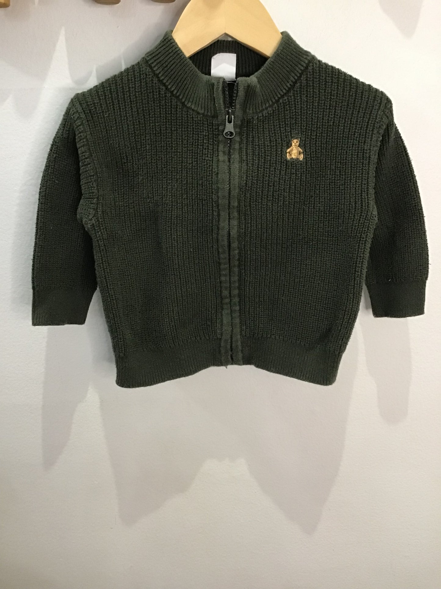 Green zip-up sweater 6-12m