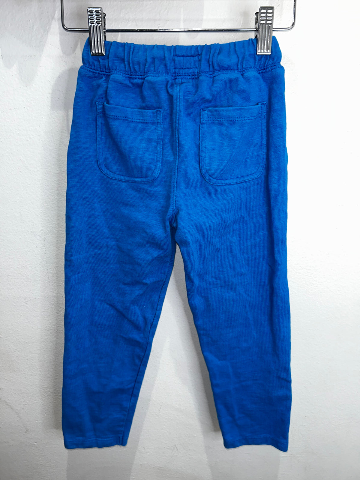 Blue skinny joggers 4y