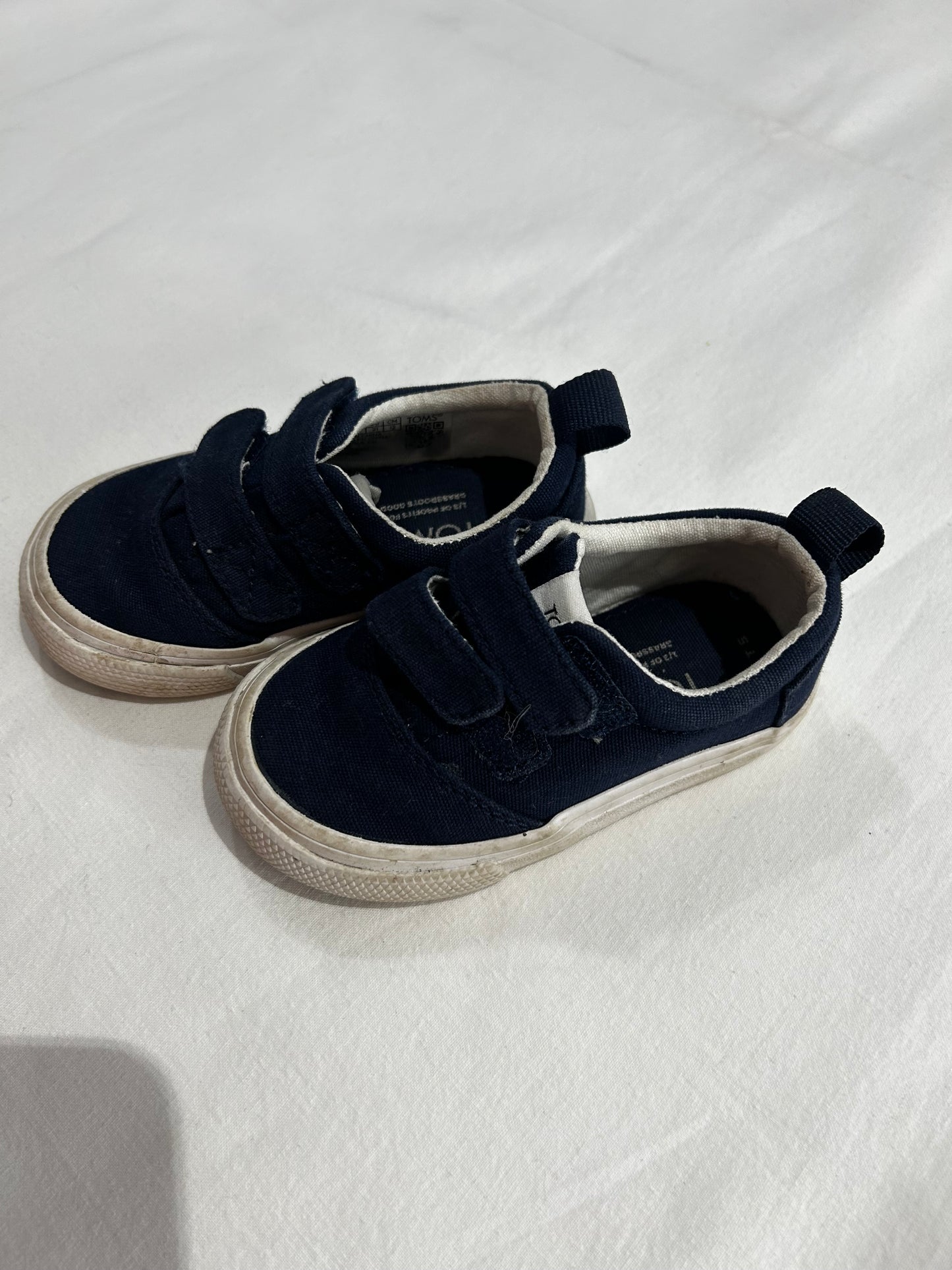 C5 navy Toms shoes