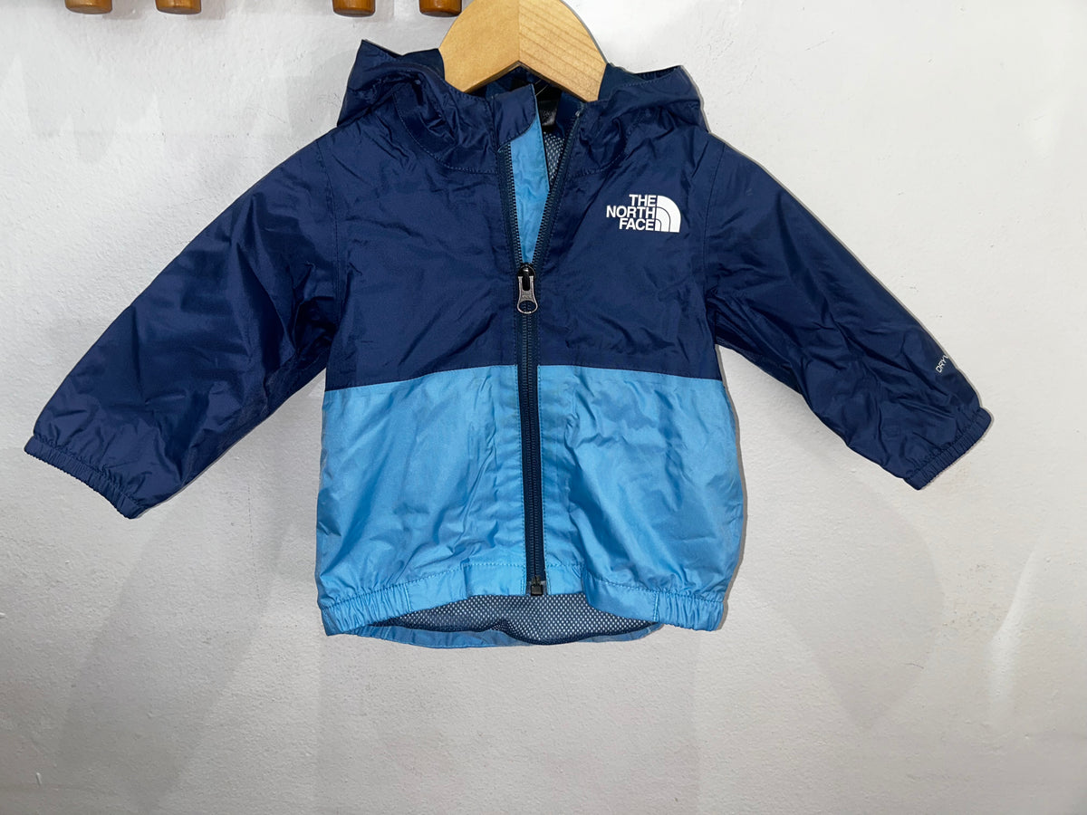 The North Face blue rainjacket 3-6m
