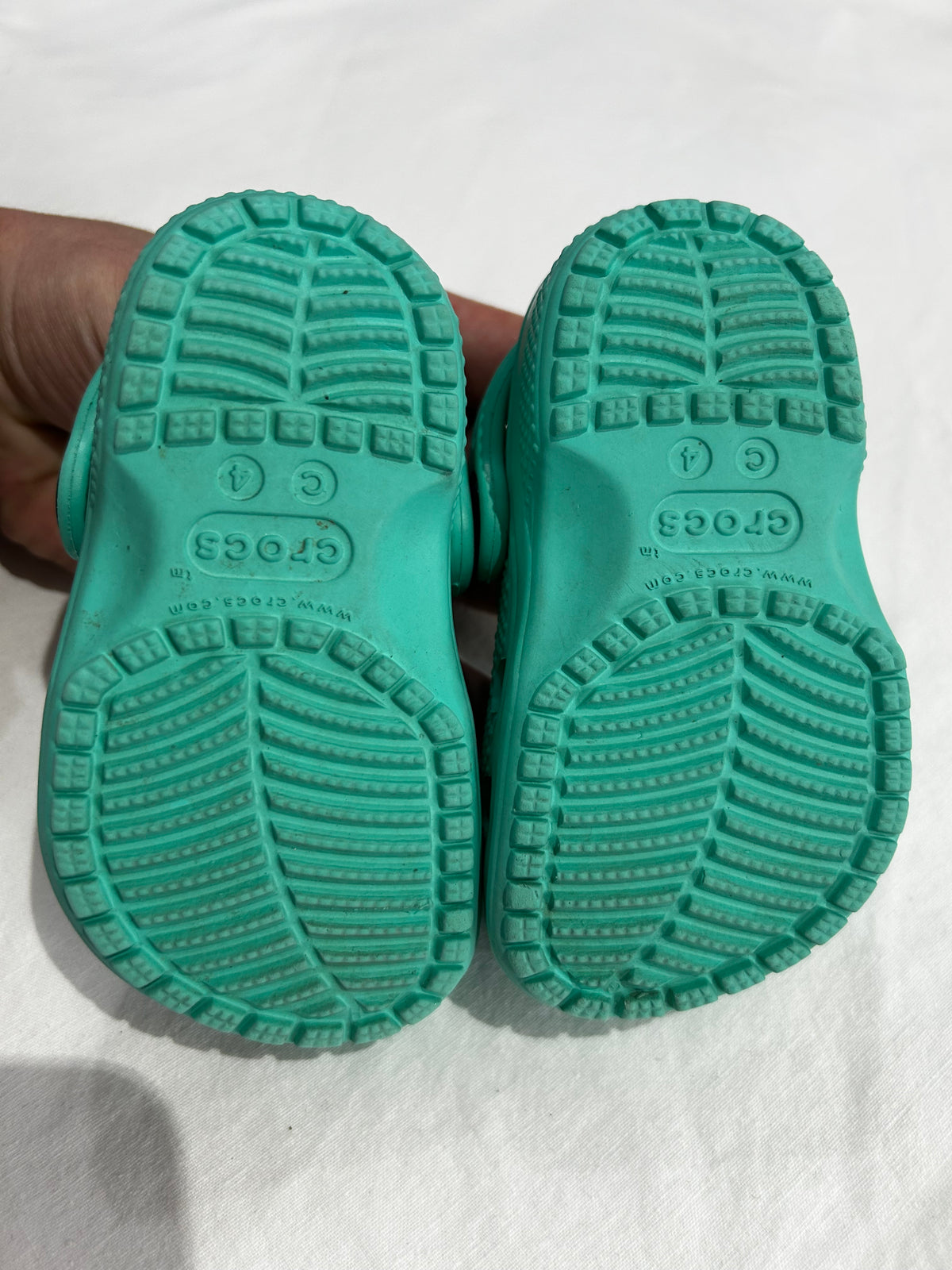 C4 teal Crocs