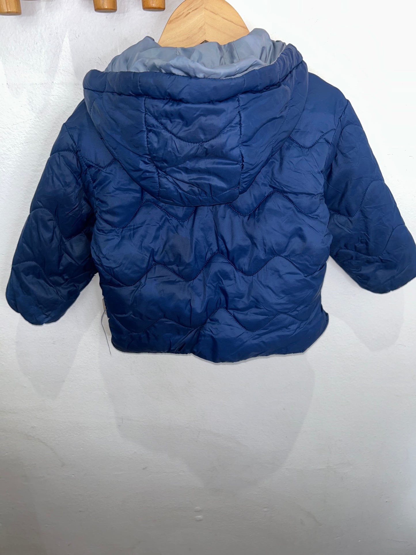 Blue puffer jacket 9-12m
