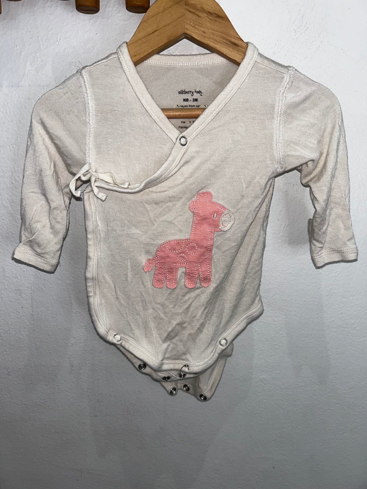 Pink giraffe onesie 0-3m