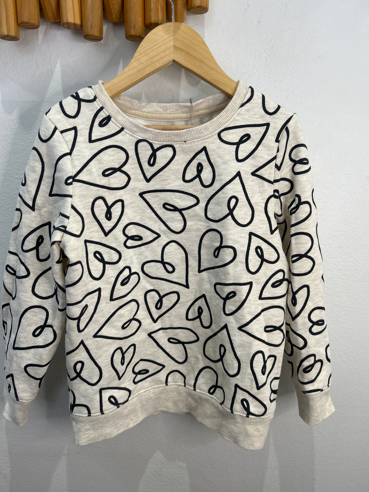 Drawn black hearts pullover 5y