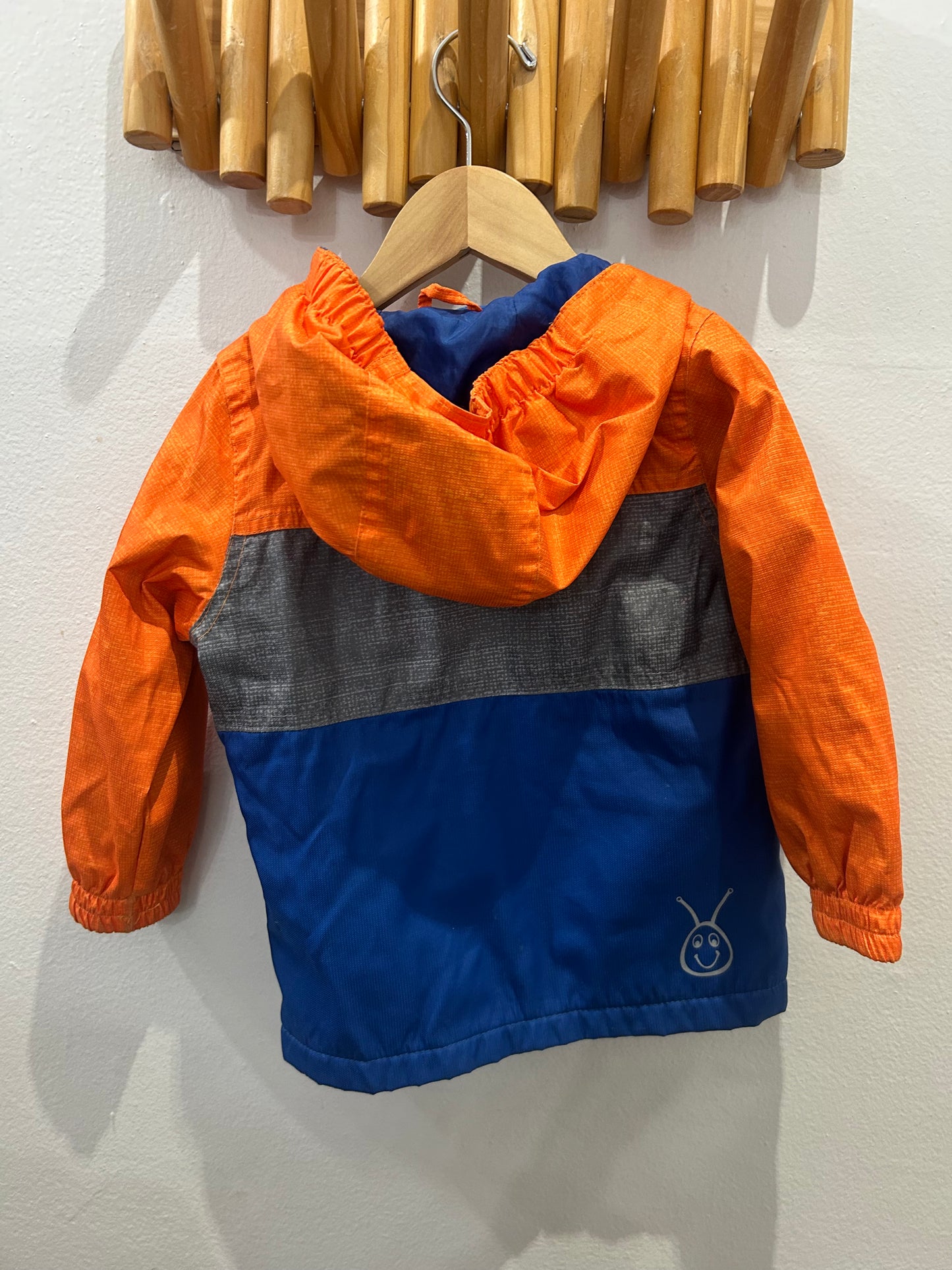 Orange dino rainjacket 24m