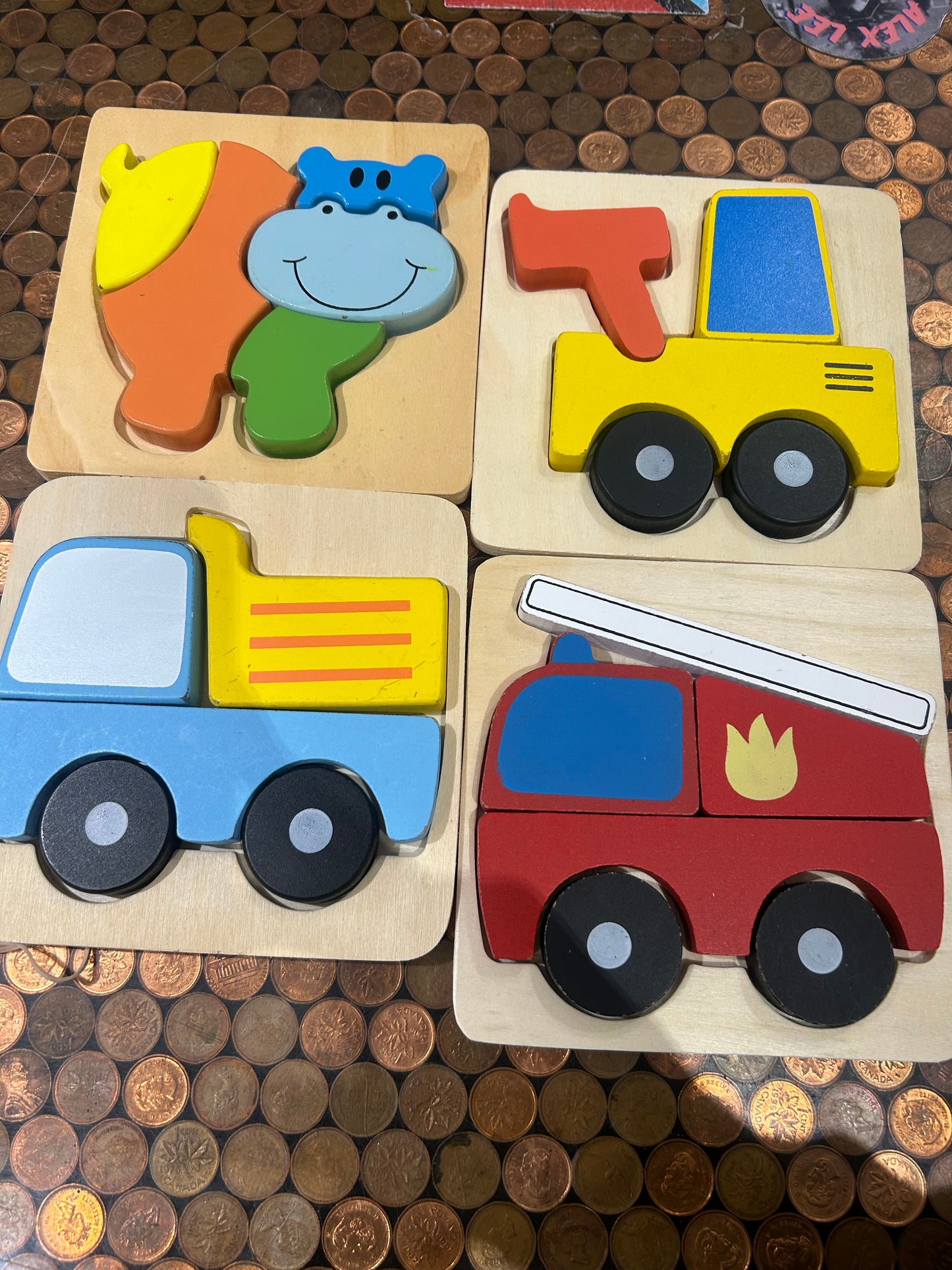 Four pack of wooden puzzles