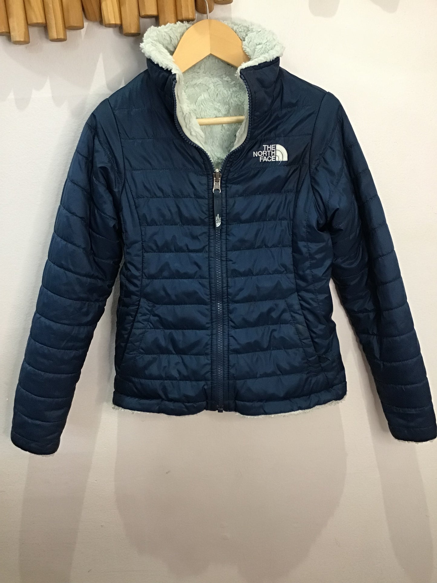 The North Face blue jacket 7-8y