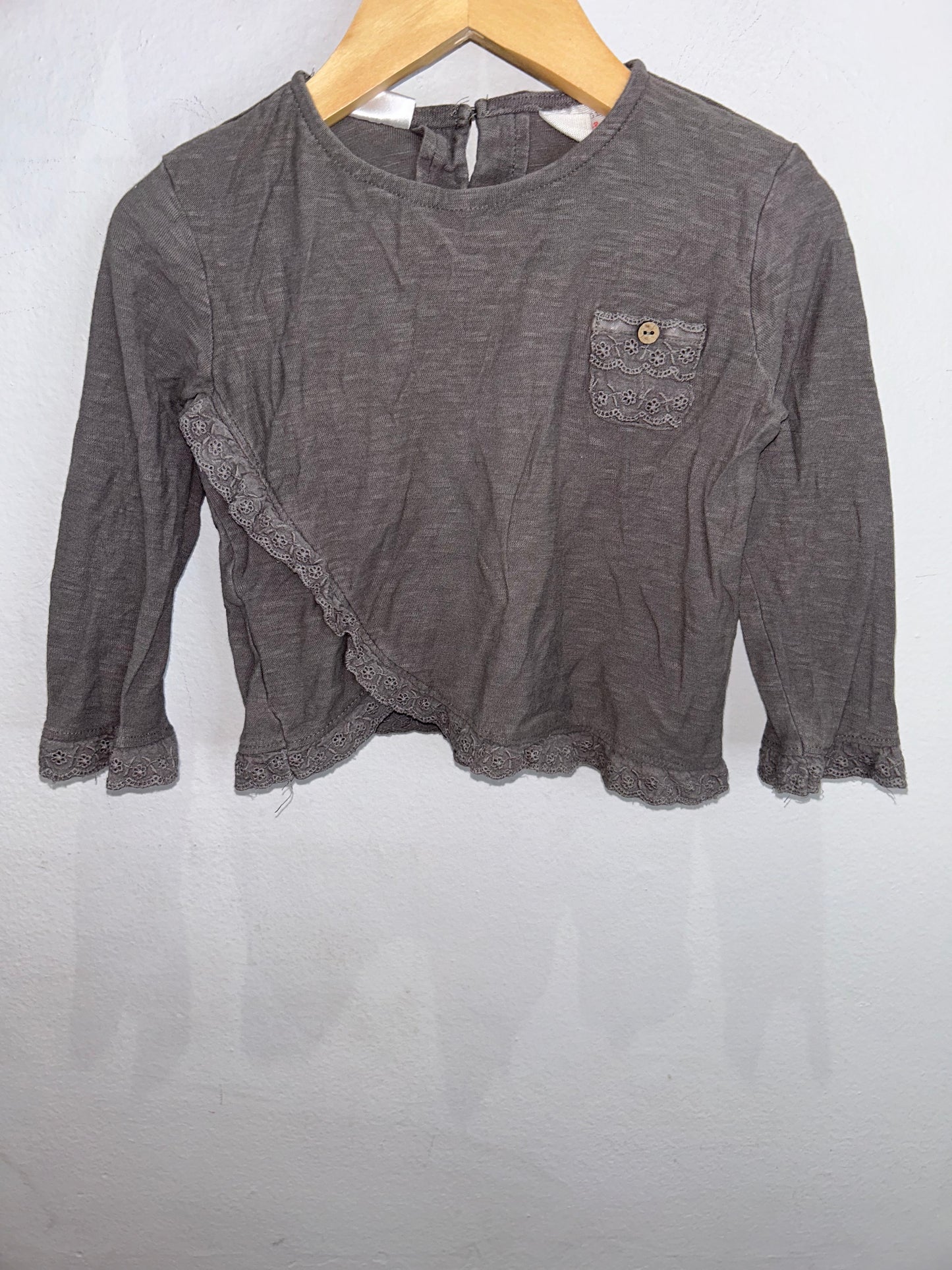 Grey frilly longsleeve 9-12m