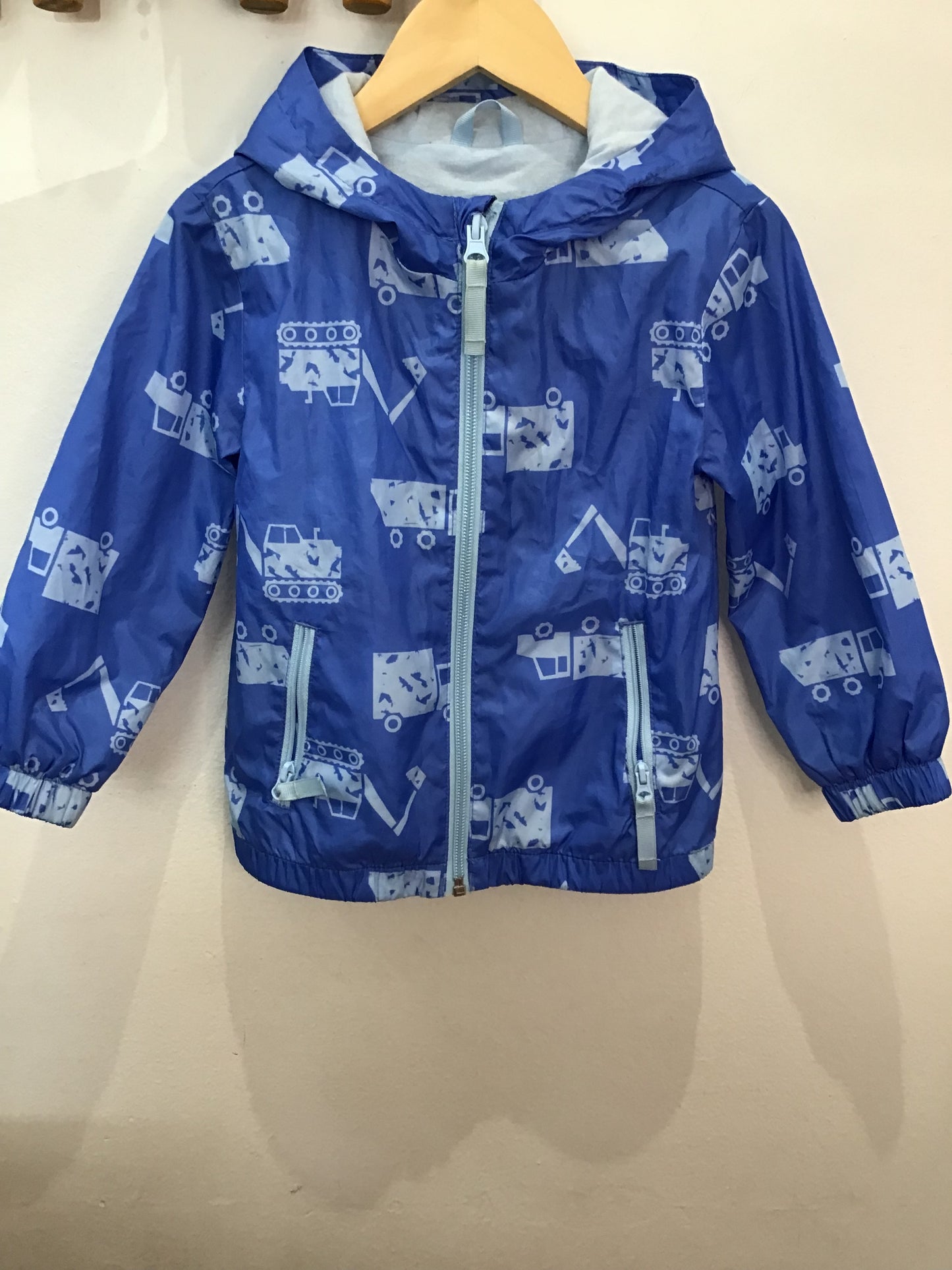 Blue construction print rain jacket 2y