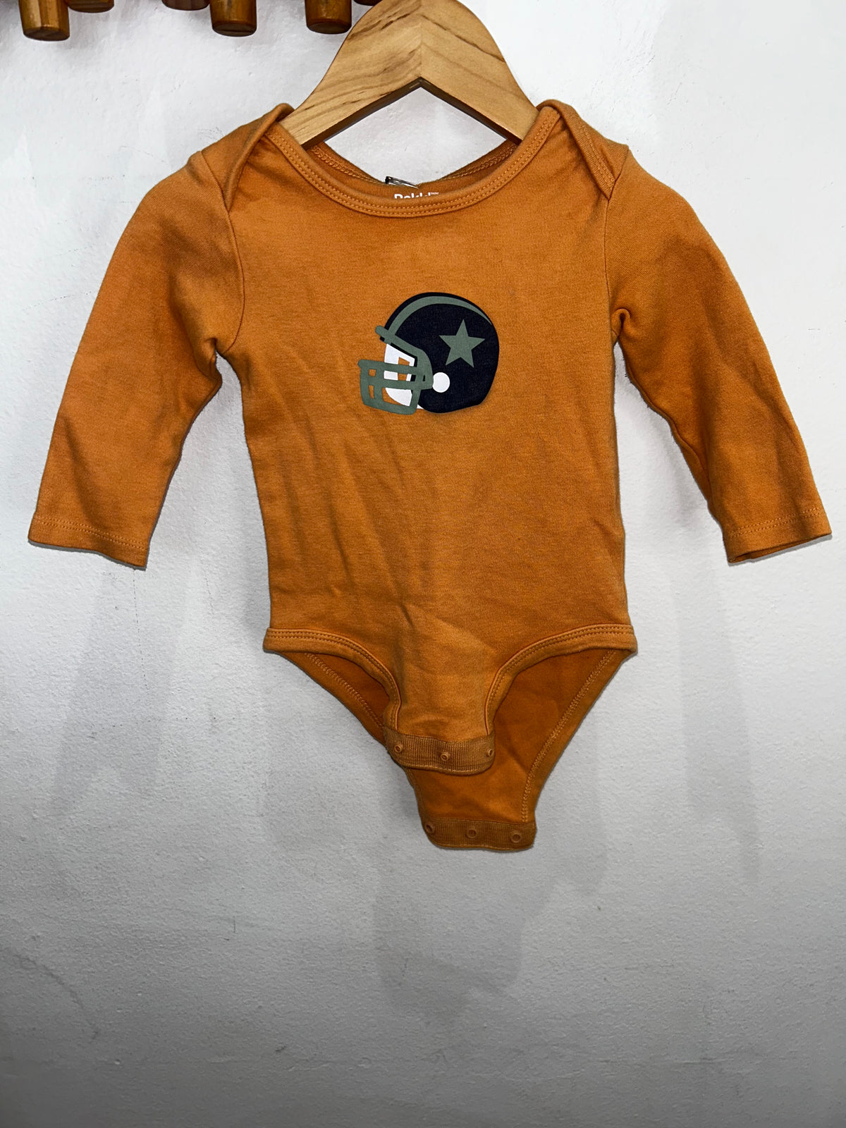 Orange football helmet onesie 9m