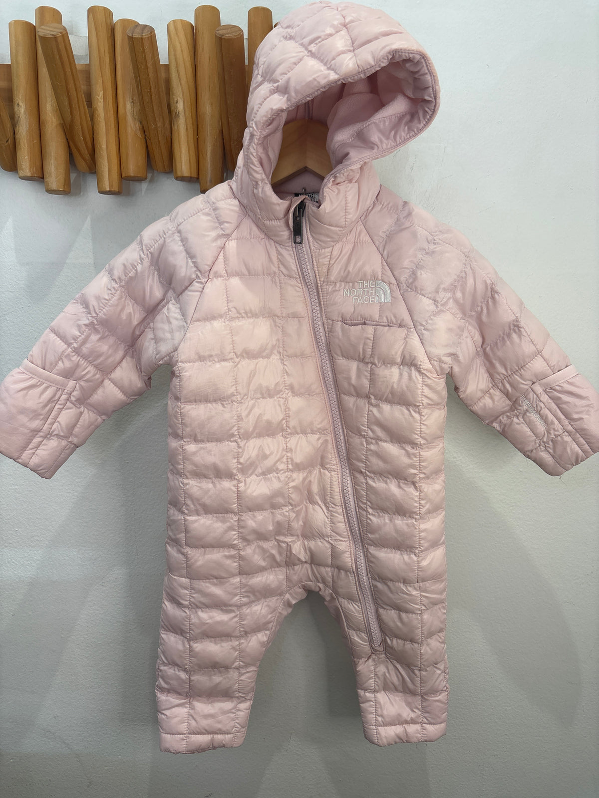 The North Face pink snowsuit 3-6m
