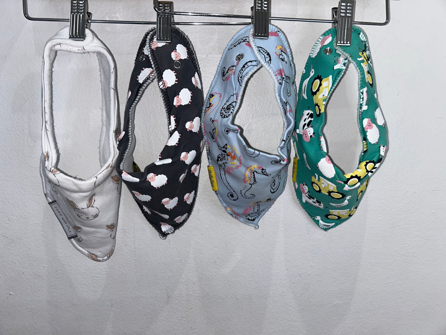 Four pack fleece lined bibs- animals