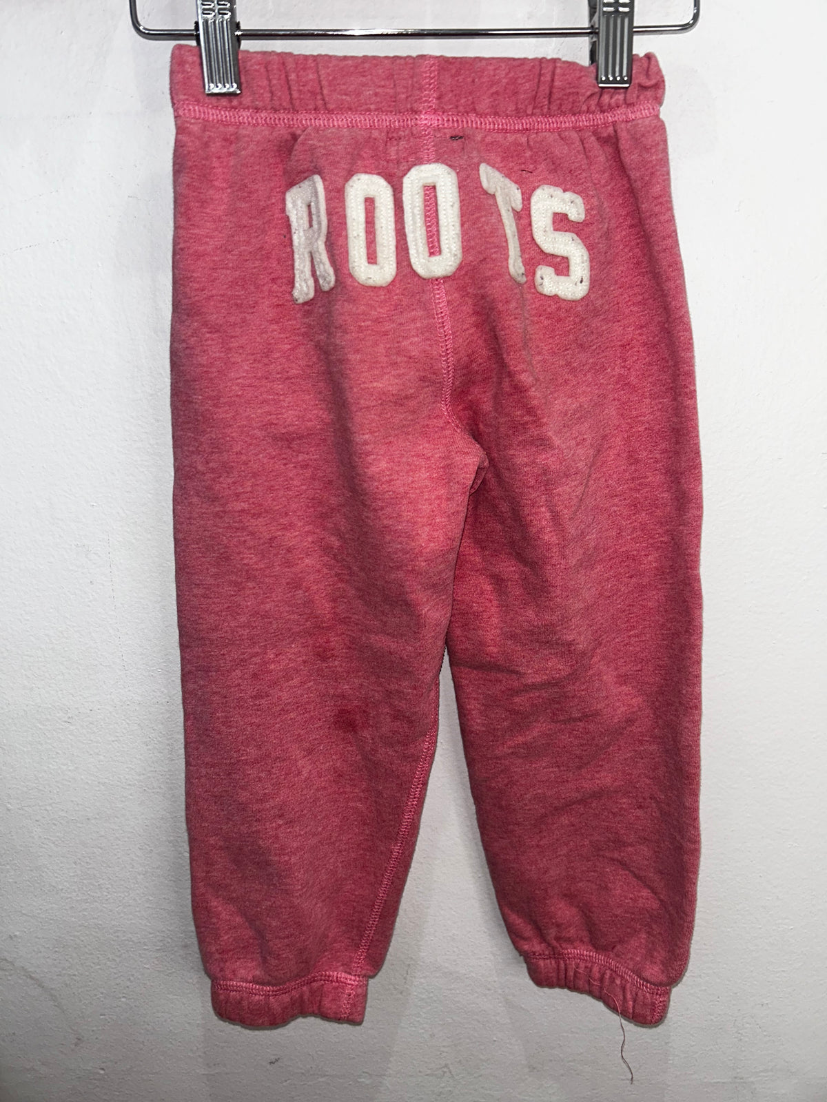 Roots peach joggers w bum print 4y