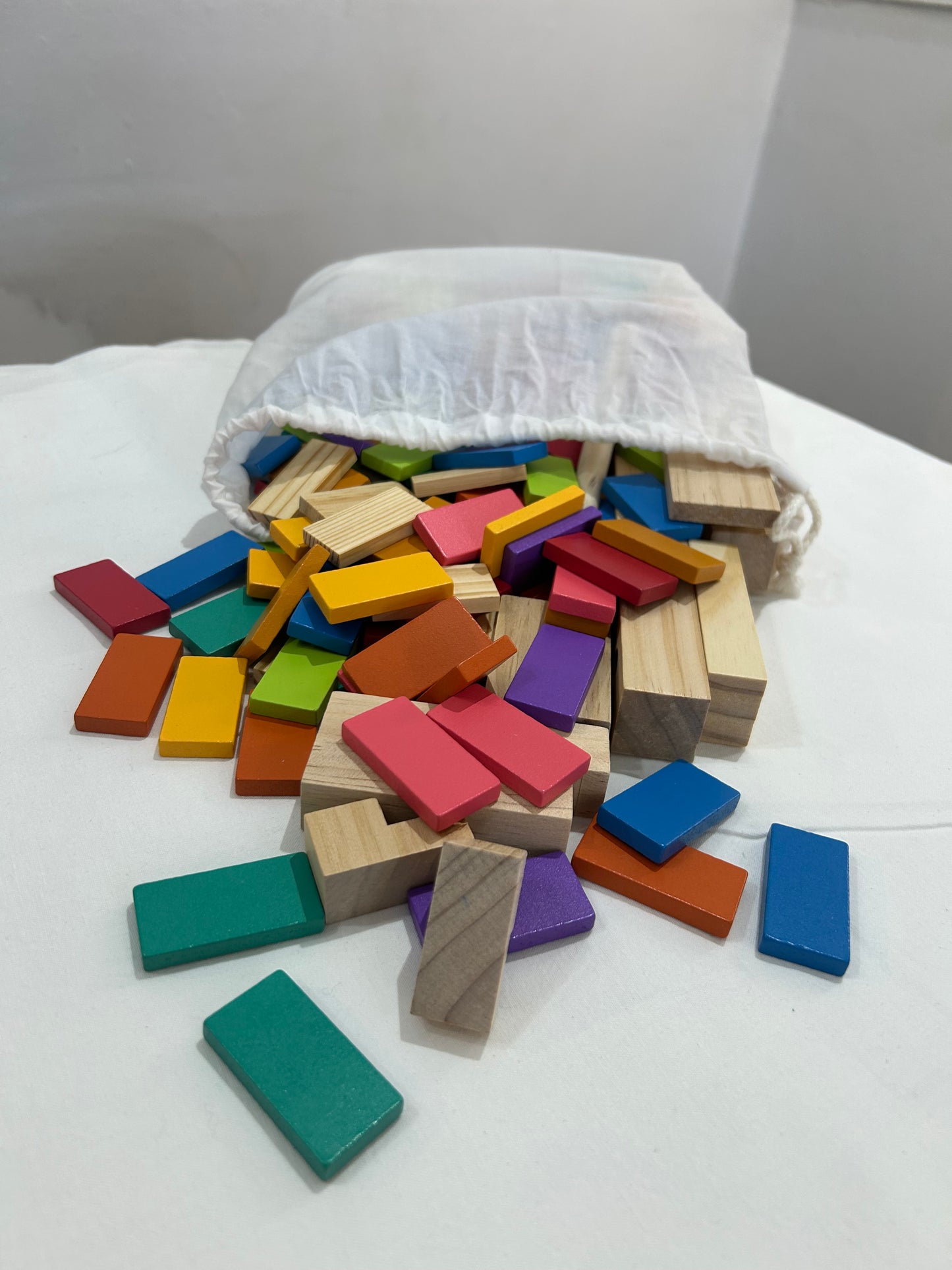 Assorted wooden blocks in bag