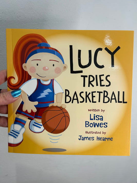 Lucy tries basketball (softcover)