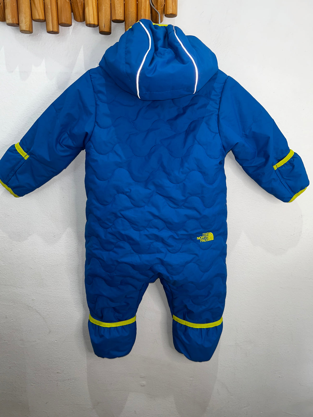 The North Face blue snowsuit 6-12m