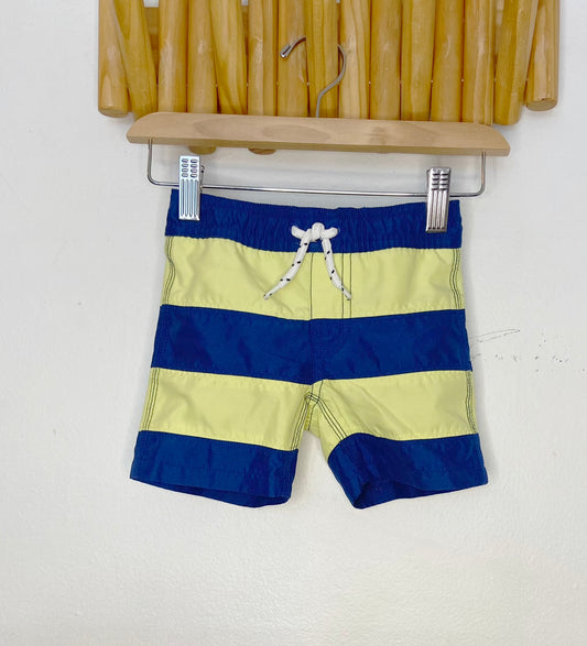 Yellow and blue swim shorts 6-12m