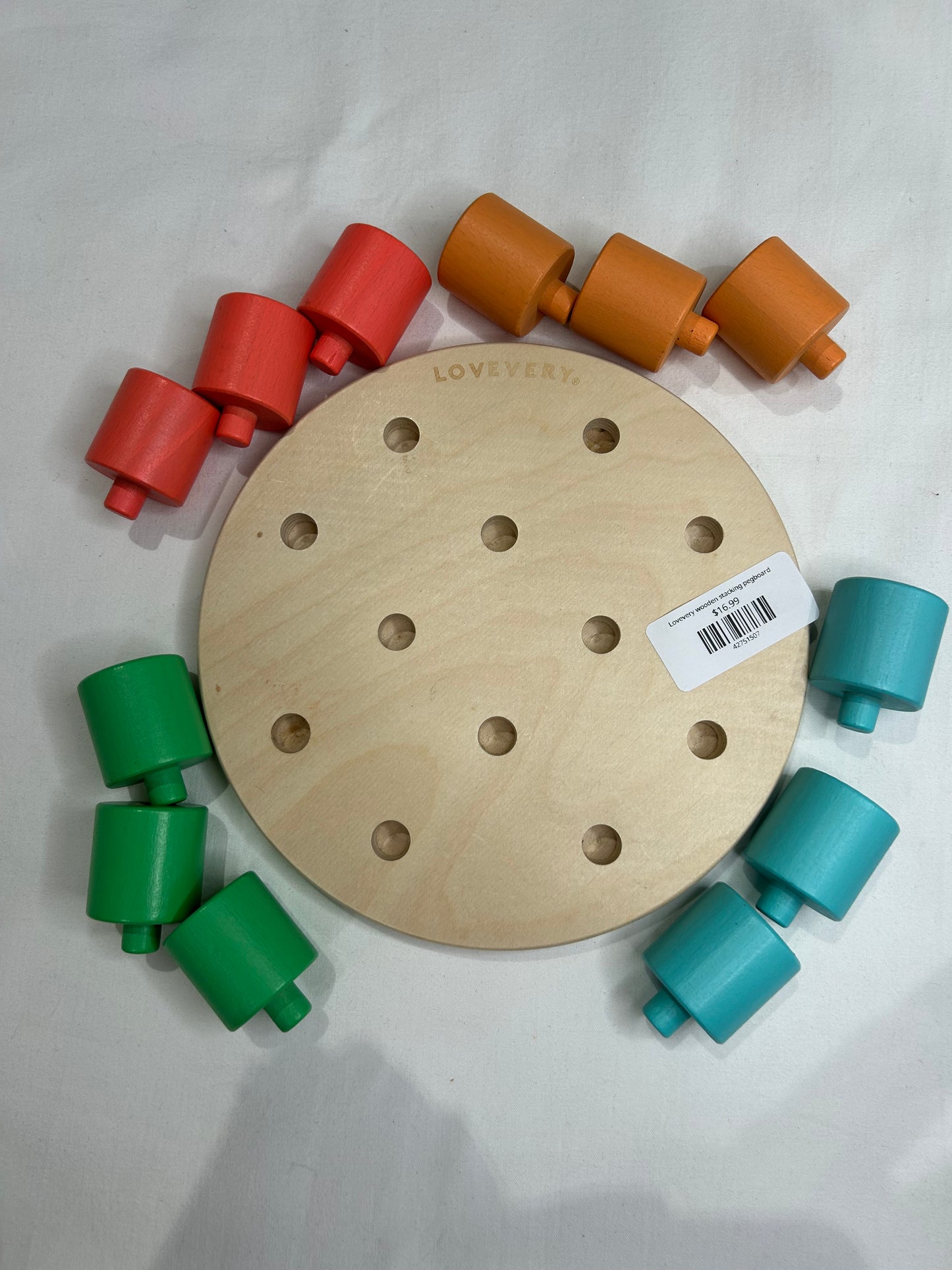 Lovevery wooden stacking pegboard