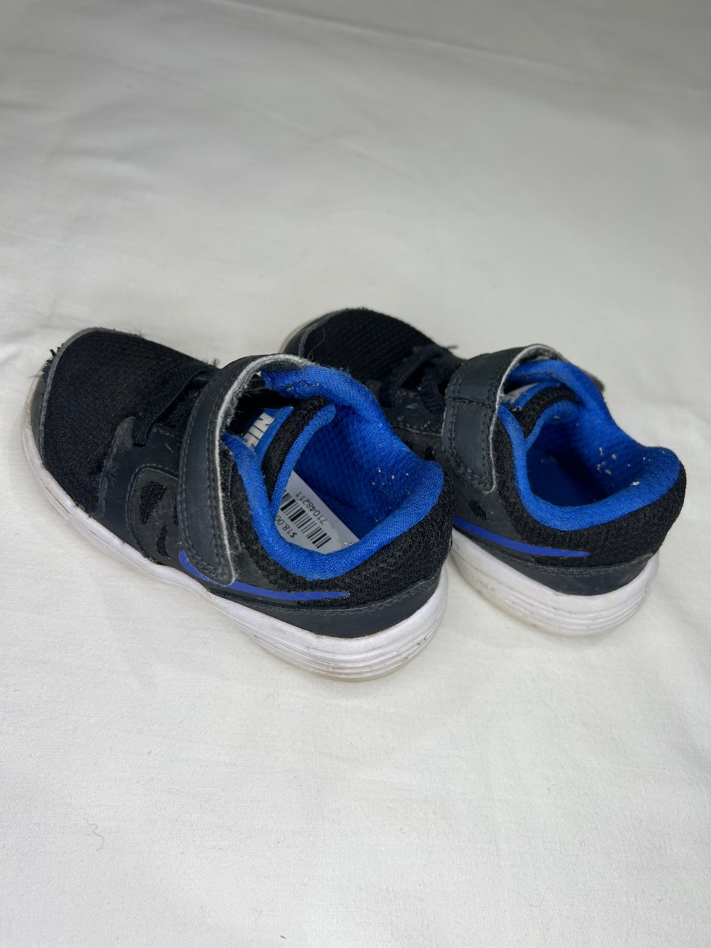 C6 Nike black runners