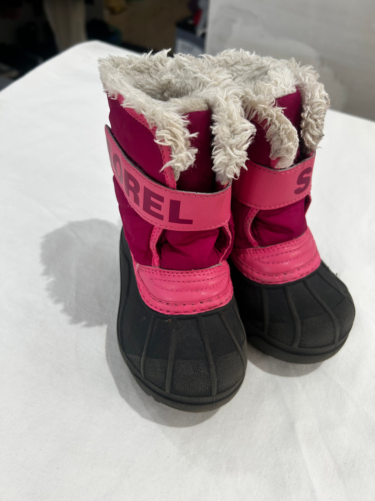 C7 pink Sorel winter boots