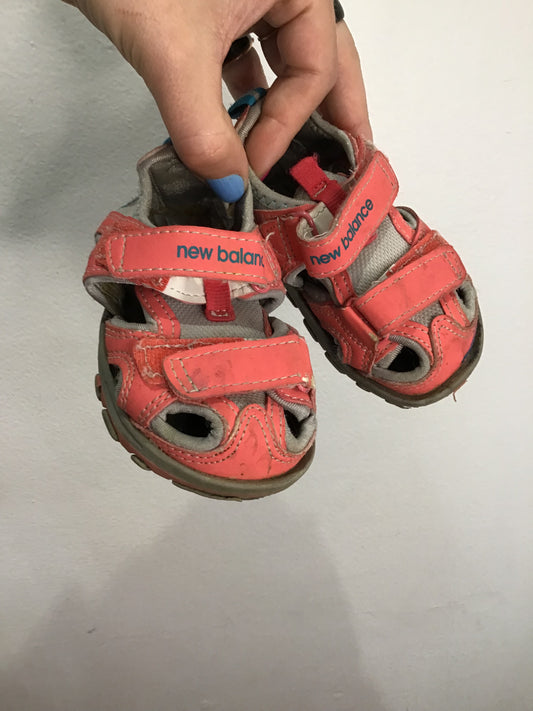 C6 pink New Balance sandals