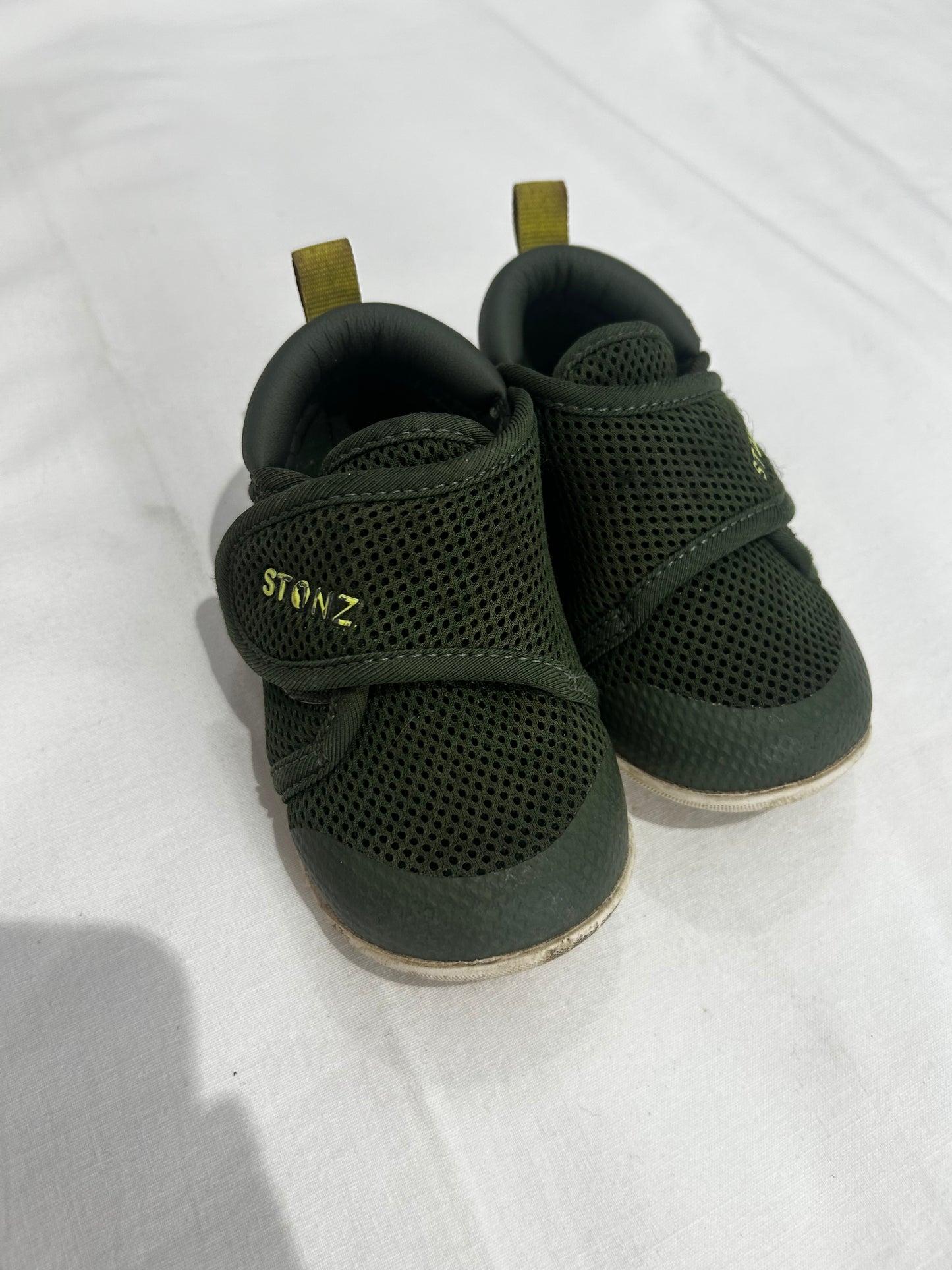 C6 green Stonz shoes