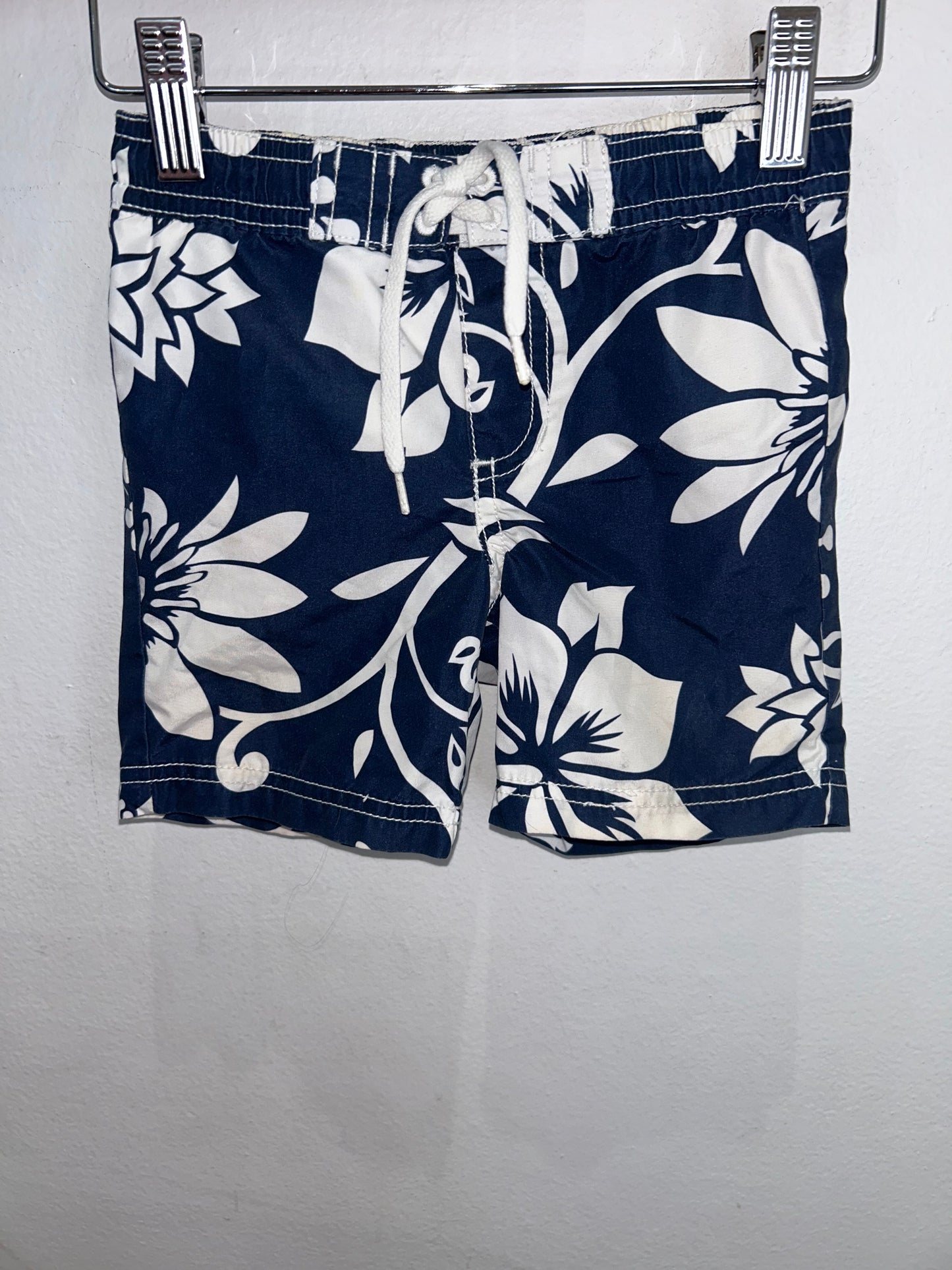 Blue big flowers swim shorts 12-18m