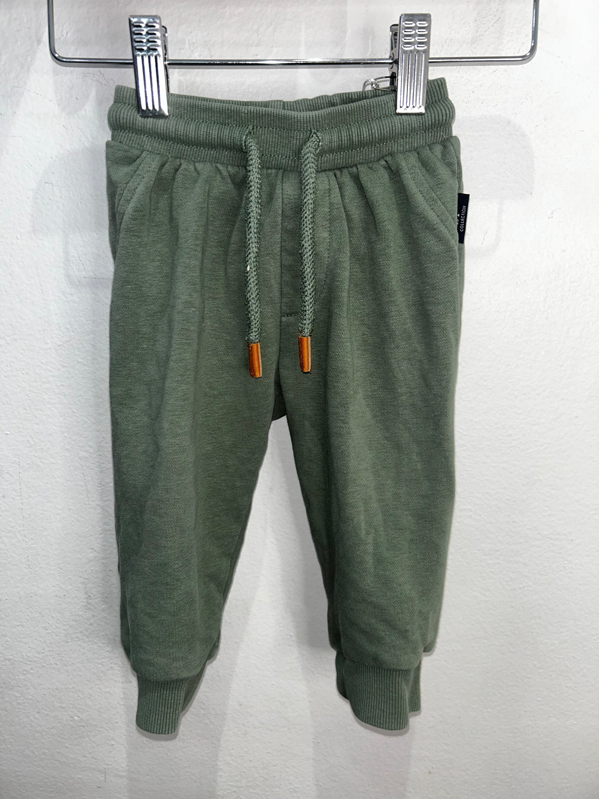Dark green joggers 9m