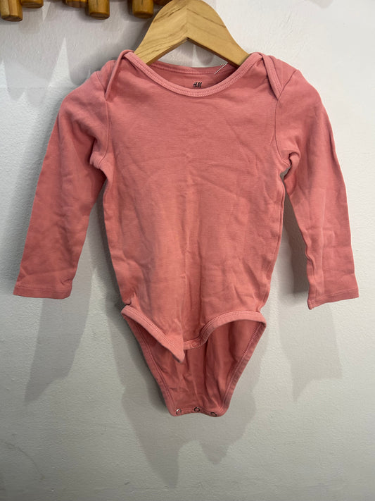 Bright peach onesie 12-18m