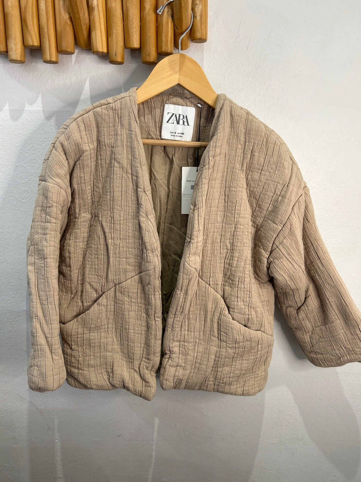 Beige textured topper - adult S