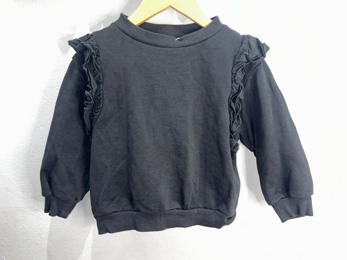 Black frilly shoulder pullover 2-4y