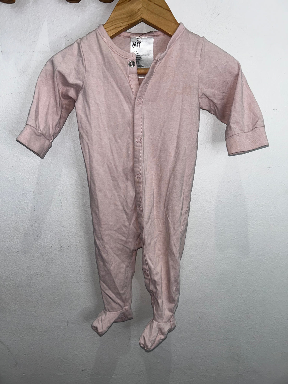 Light pink sleeper 2-4m