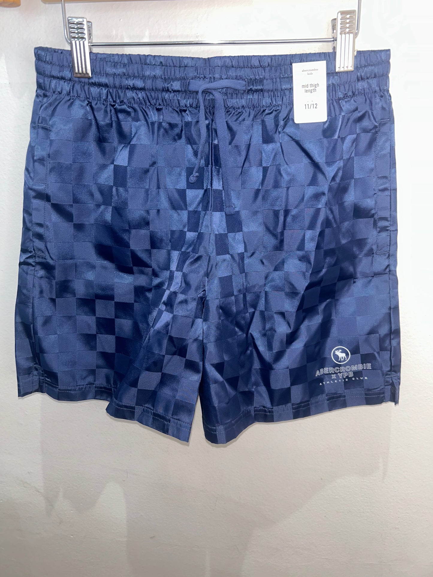 Mid thigh length activewear shorts 11-12y NEW