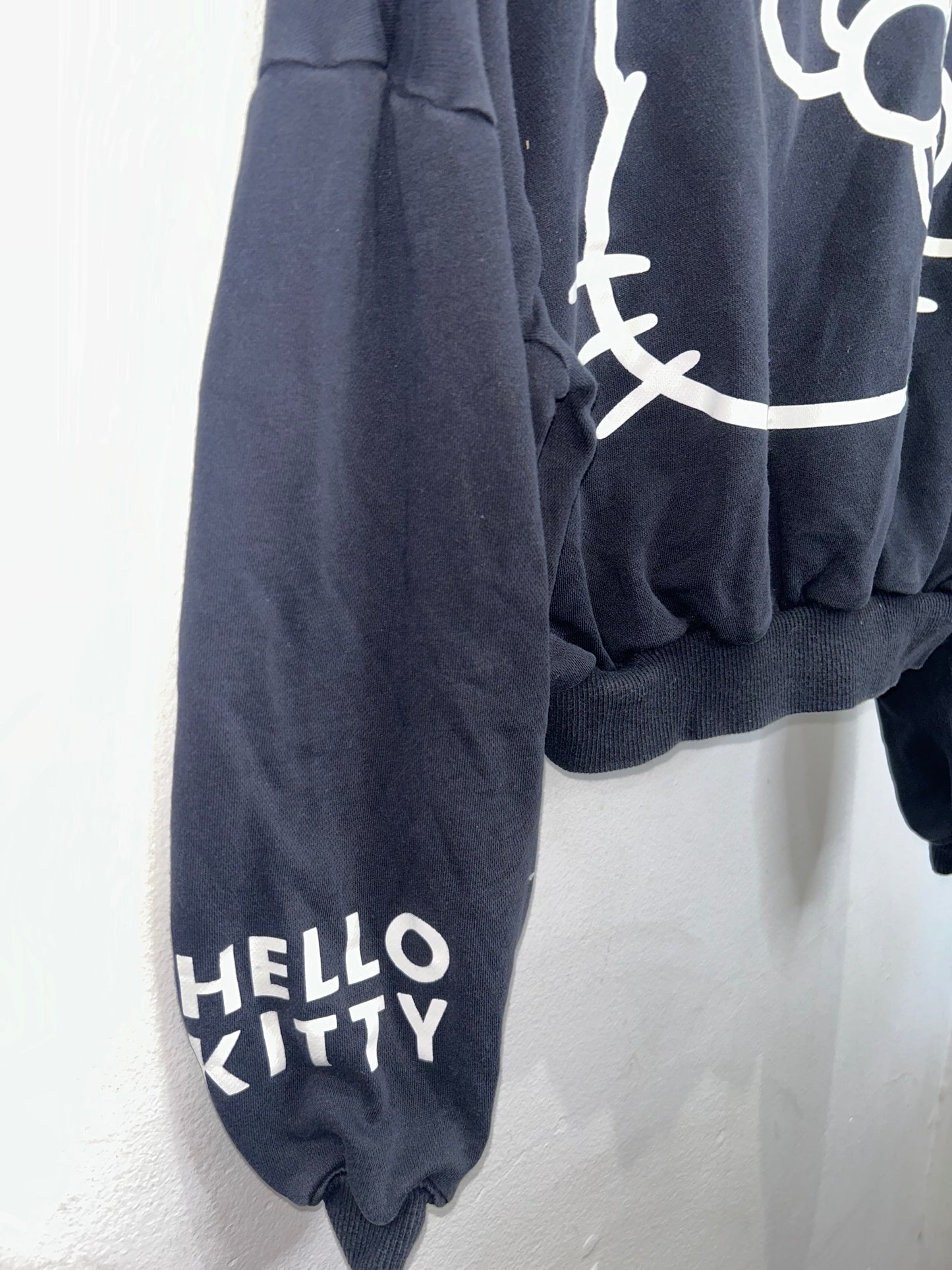 Black Hello Kitty pullover 10-12y