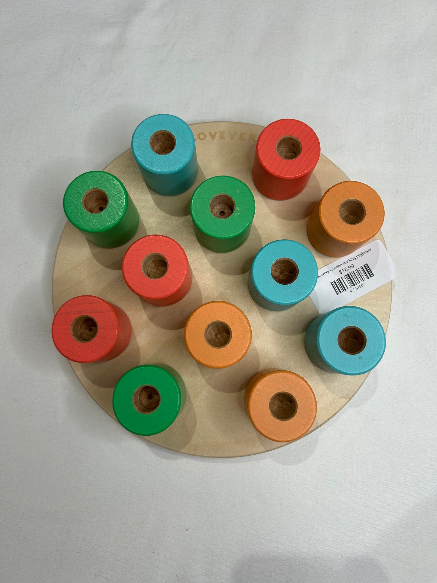 Lovevery wooden stacking pegboard