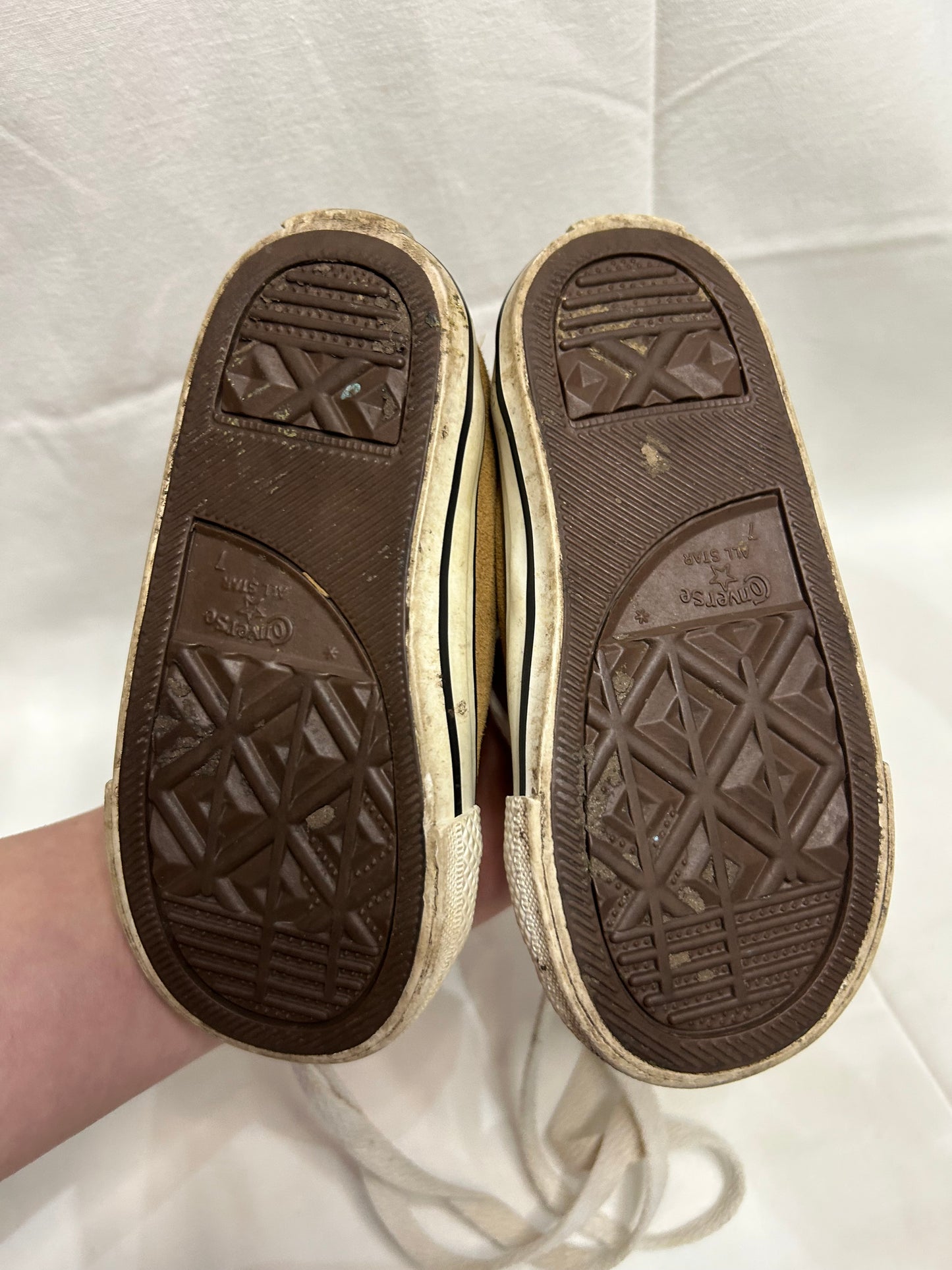C7 brown canvas hightops