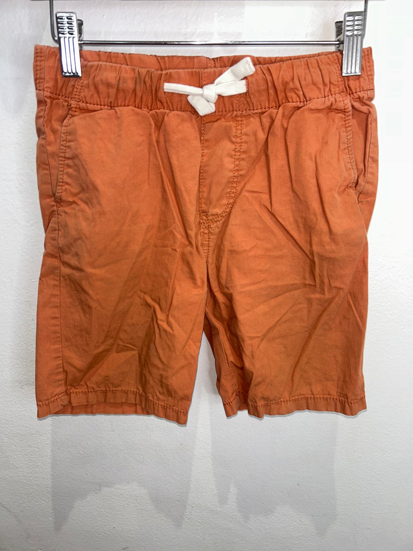 Light orange shorts 7-8y