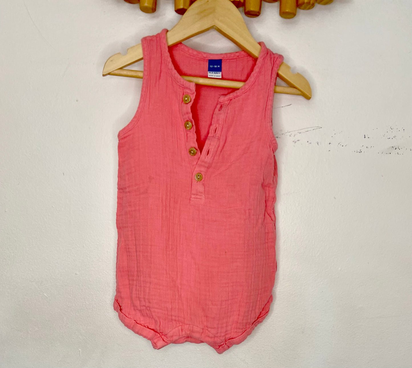 Peach textured shorty romper 12-18m