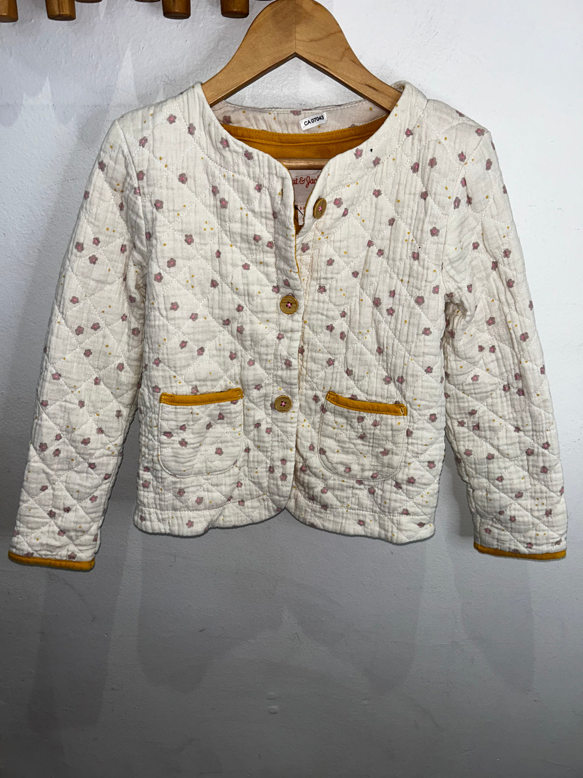 Cream quilted jacket 6y
