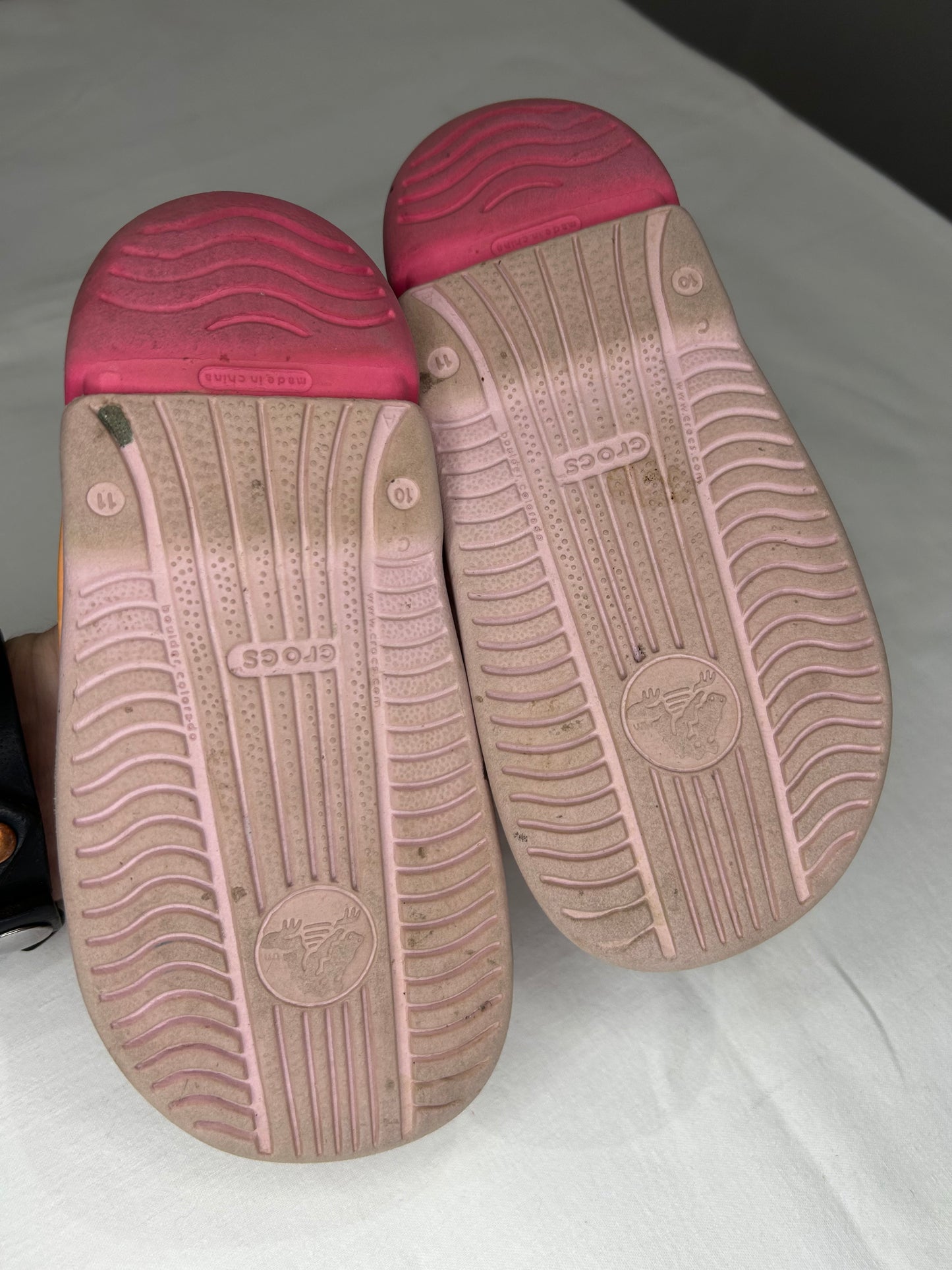 C10 pink Crocs sandals