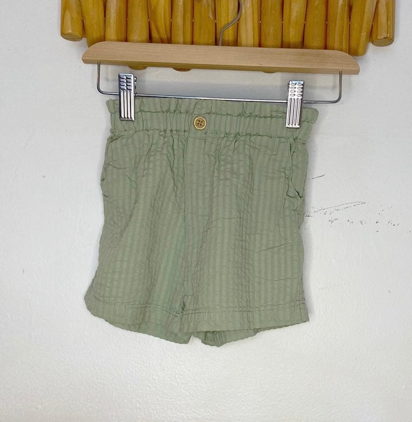 Light green shorts 12-18m