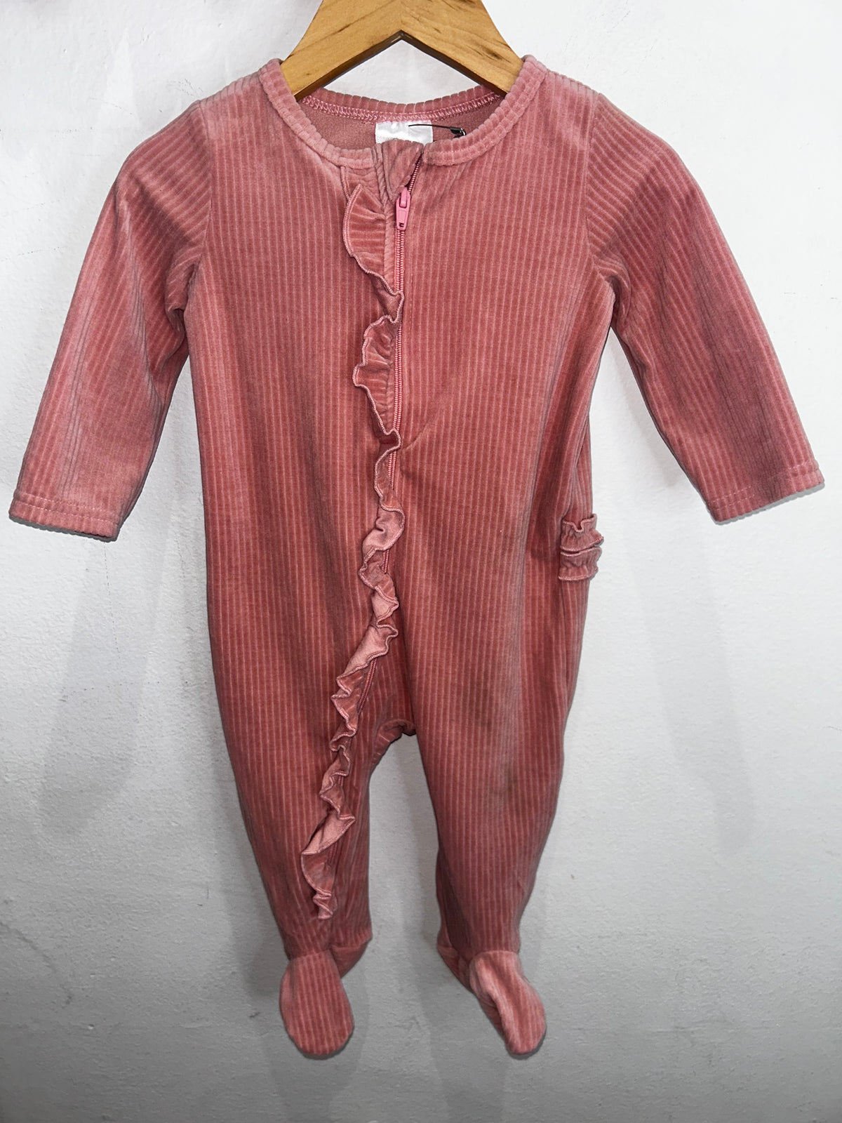 Fleecy frilly pink sleeper 3-6m