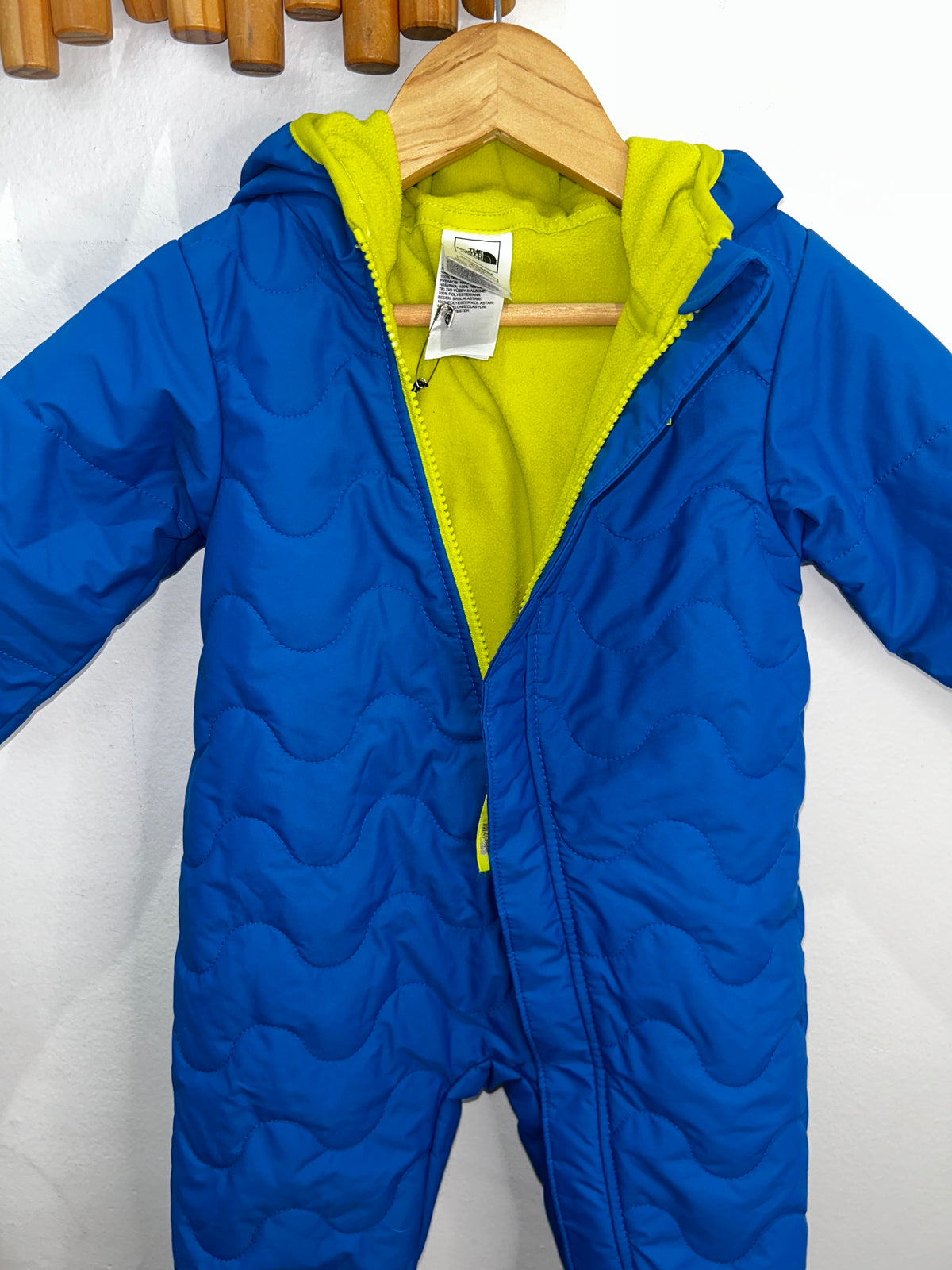 The North Face blue snowsuit 6-12m