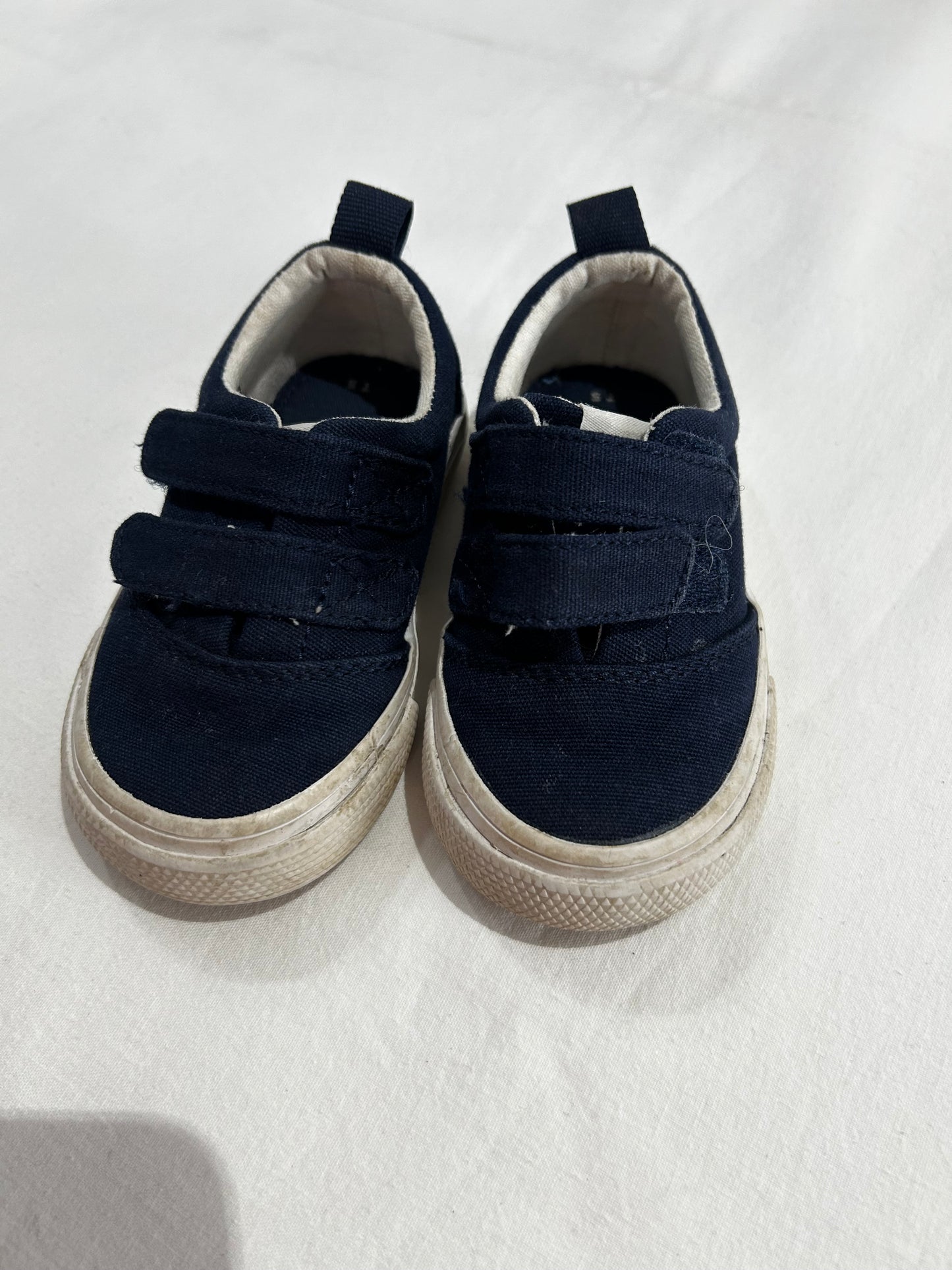 C5 navy Toms shoes