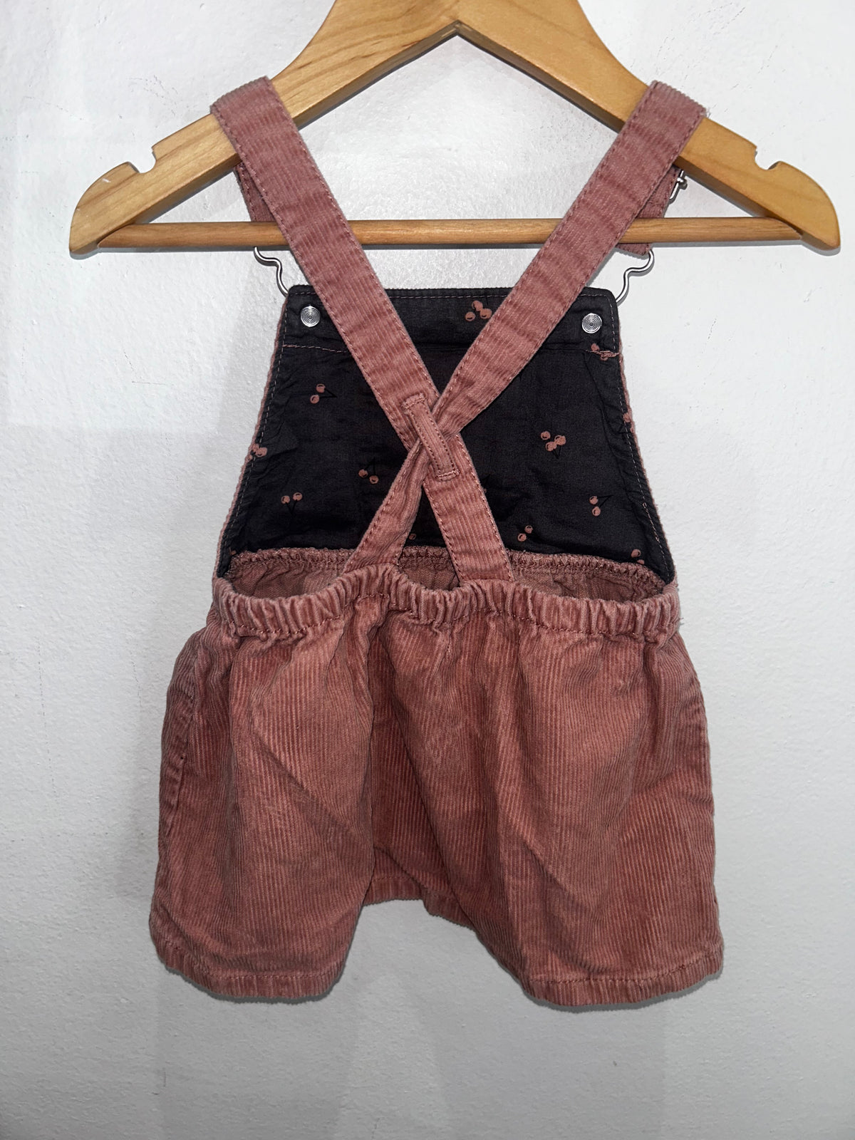 Pink cord skirt romper 9-12m